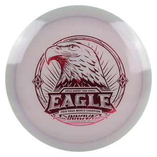 Innova Disc Golf Star Team Tour Series Gregg Barsby Proto Glow Champion Eagle 7/4/-1/3 Grey/Maroon 173 grams