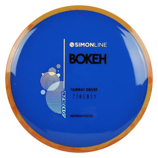 Axiom Disc Golf Simon Line Neutron Bokeh Fairway Driver 7/6/0/1 Dark Blue/Orange Yellow 174 grams