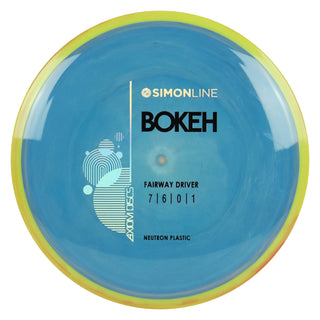 Axiom Disc Golf Simon Line Neutron Bokeh Fairway Driver 7/6/0/1 Storm Blue/Yellow Red 168 grams