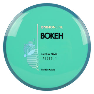 Axiom Disc Golf Simon Line Neutron Bokeh Fairway Driver 7/6/0/1 Teal/Storm Blue 173 grams
