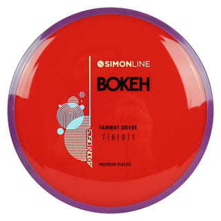 Axiom Disc Golf Simon Line Neutron Bokeh Fairway Driver 7/6/0/1 Red/Purple 167 grams