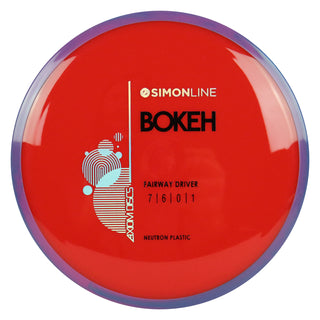 Axiom Disc Golf Simon Line Neutron Bokeh Fairway Driver 7/6/0/1 Red/Pink Purple 169 grams